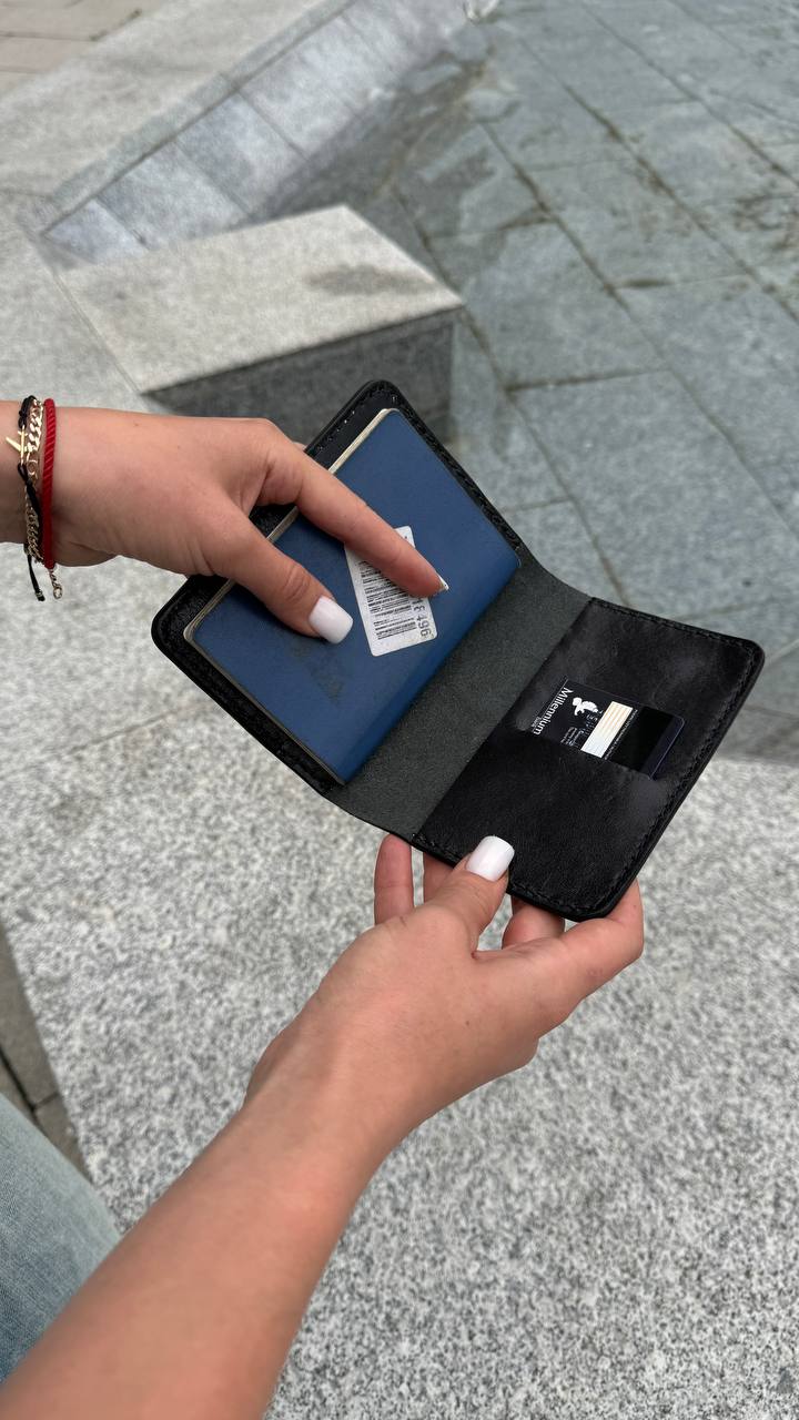 Passport cover with brass knuckles in black  image 1