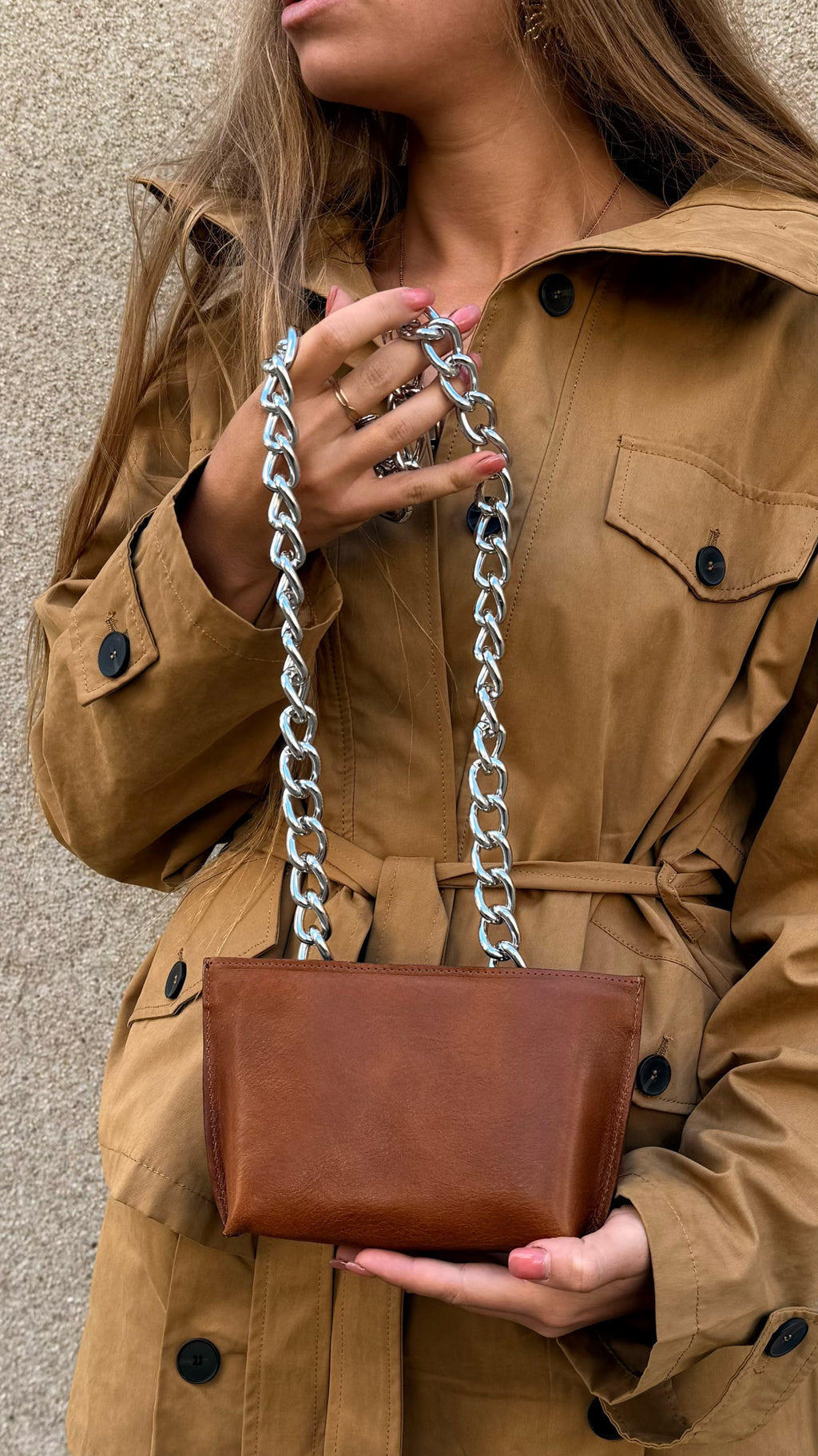 Mini bag with brass knuckles