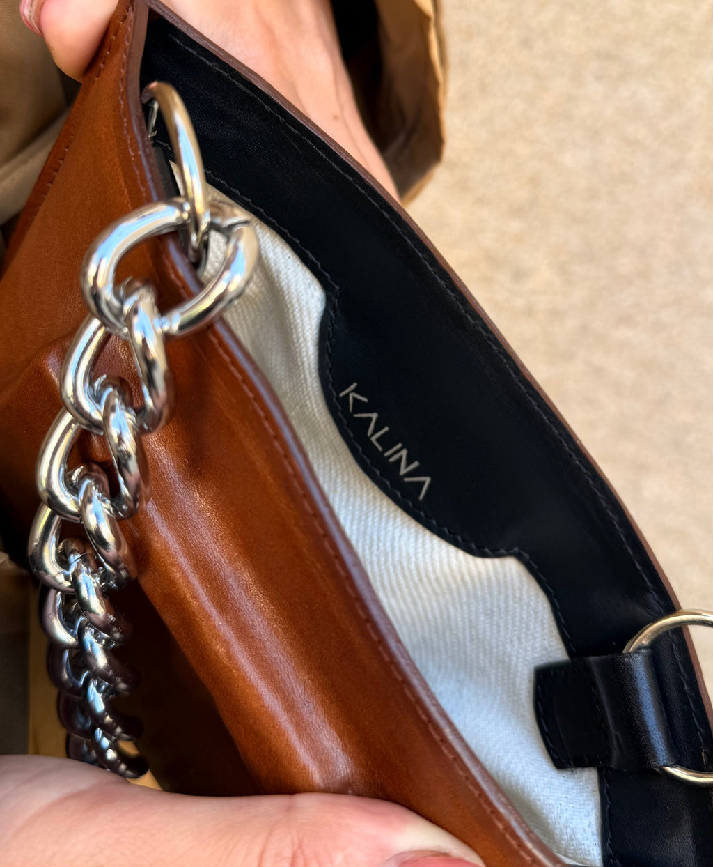 Mini bag with brass knuckles