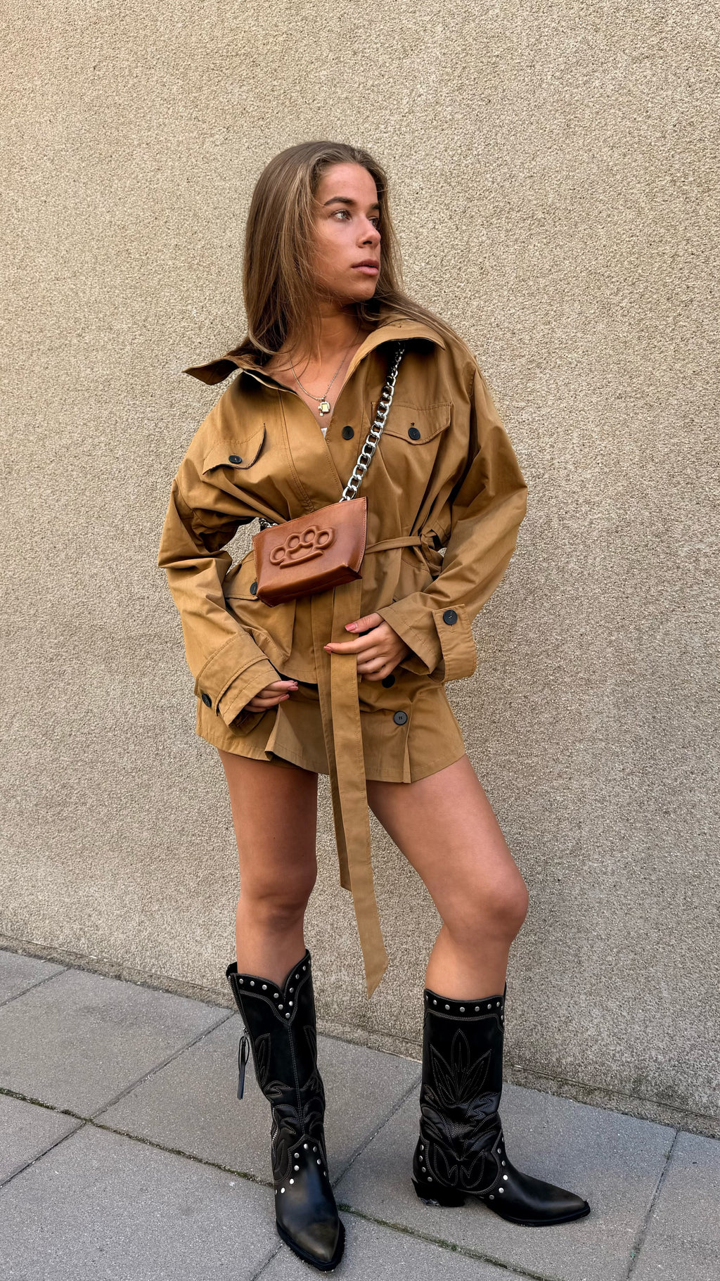 Mini bag with brass knuckles